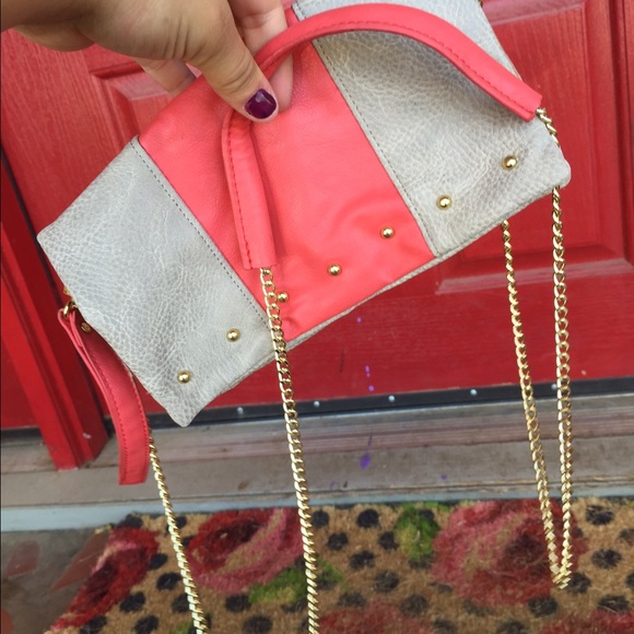 Pink and grey clutch with shoulder strap