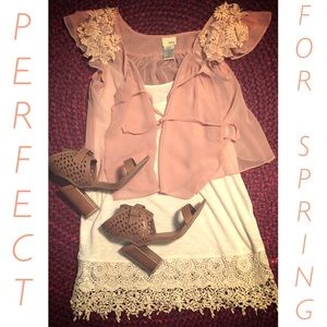 New spring styles are here! Get this top!