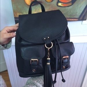 Brand new Faux black leather backpack