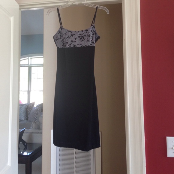 Black fitted spaghetti strap dress with padded bra