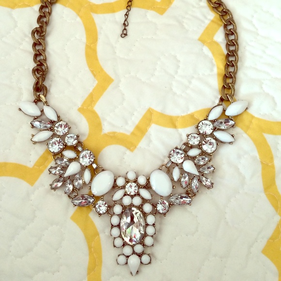 Costume jewelry white stone work. Antique gold