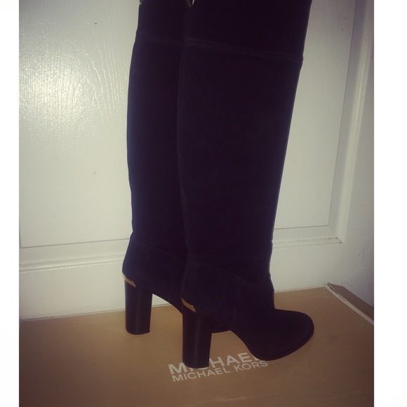 Suede Michael Kors knee high boots.