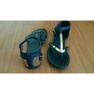 Black sandals with rose gold