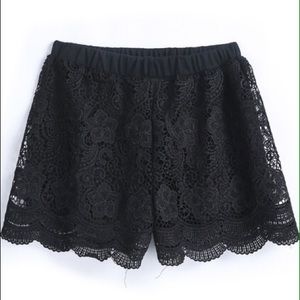 Black floral patterned crochet shorts