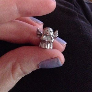 Guardian angel charm.
