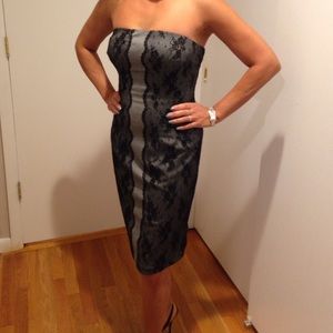 Black lace over a grey flannel short evening dress