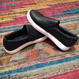 Black slip on sneakers