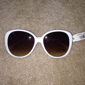 white sunglasses with gold detail
