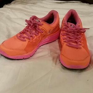 Neon pink and orange Nike tennis shoes!