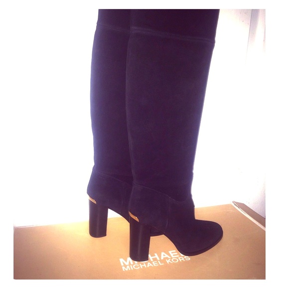 Michael Kors all black high knee suede boots.