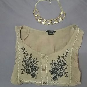 Beautiful brown blouse with flower print