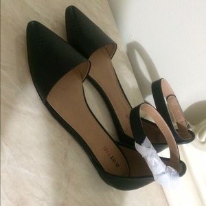 Black pointy flats