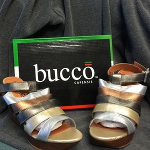 Metallic **Reduced** Wedge. Never worn