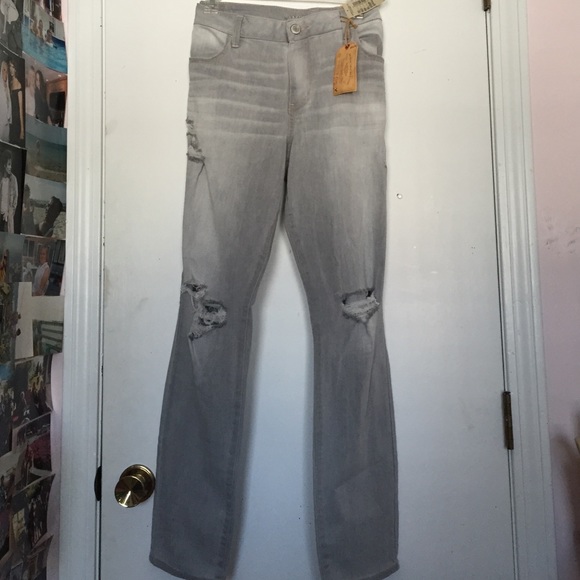 Silvery grey distressed skinny jeans