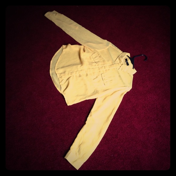 Bright yellow sheer button up with roll-up sleeves