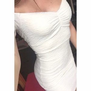 Tight white off the shoulder bodycon dress