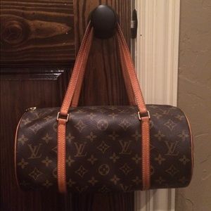 Authentic LV purse. Need this gone