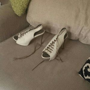 Lace up high heel shoes