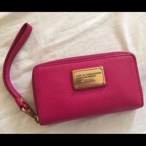 Pink Marc Jacobs wristlet wallet.