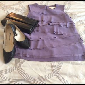 Michael Kors tiered blouse in size medium.