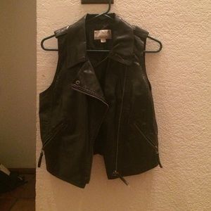 Faux leather vest.