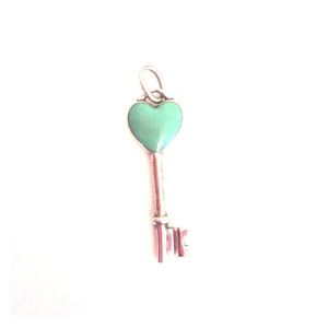 Tiffany & Co. small turquoise key charm.
