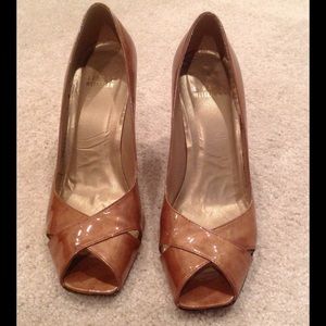 Stuart Weitzman patent leather nude pumps