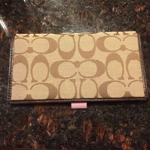 Coach checkbook cover. Pale pink inside