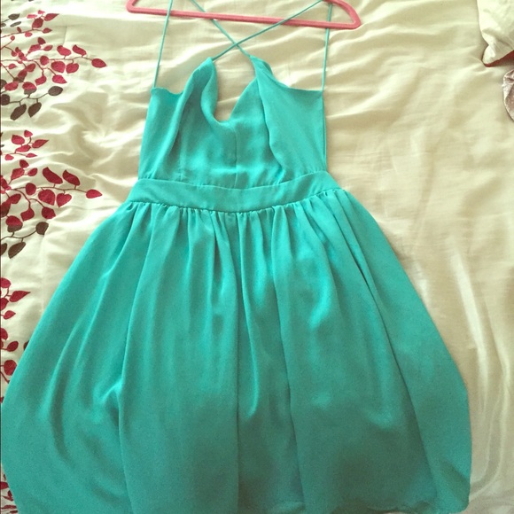 SOLD Large mystic criss cross open back dress