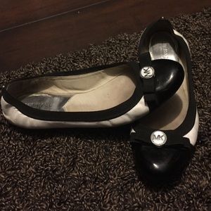 black and white Michael Kors flats