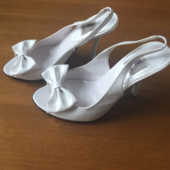 Bakers white sling back high heels with bows