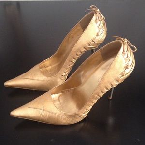Gold pointed heels