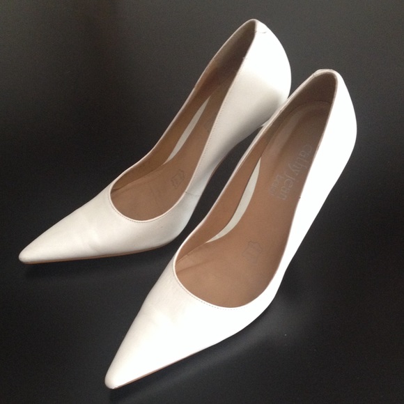 White pointed heels