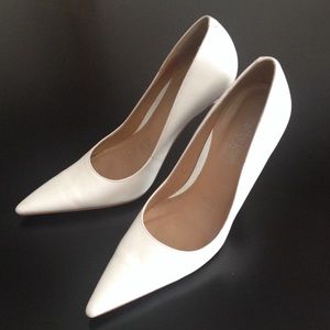 White pointed heels