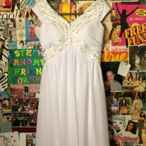 Long white gown: wedding, graduation