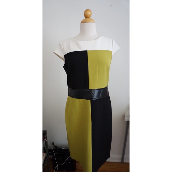 Dress with color blocking and faux leather