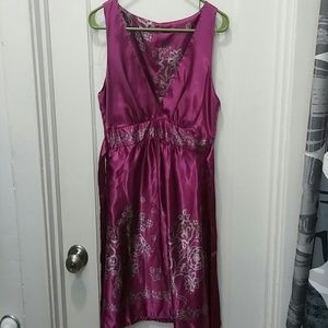 Magenta dress with floral details