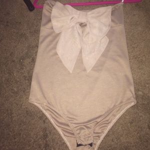 Strapless bodysuit with bow