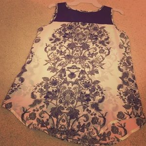 Cute chiffon shirt with a leather top!