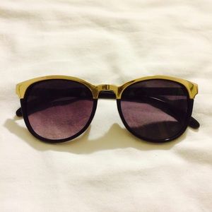 Gold top rim round sunglasses