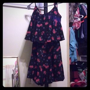 Flirty and cute black floral romper