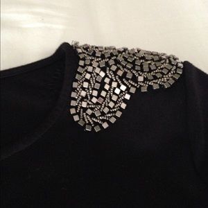 Long sleeve black shirt.