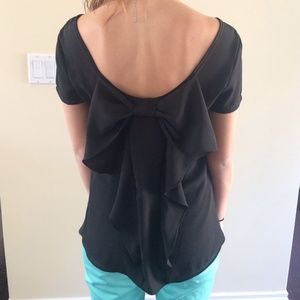 Adorable black top with bow back