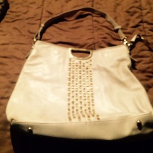 Emma & Sophia cream purse w/ gold lacing.