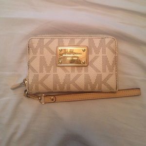 White MK wristlet.