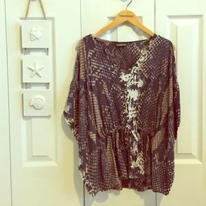 Express cut out shoulder flowy top. Pre-owned