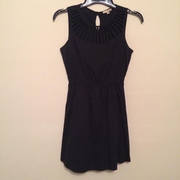 Black dress with cage cut outs at top