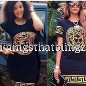 Black dress with gold detail size Large