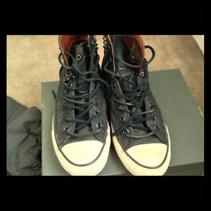 Edgy studded low and high top black converse