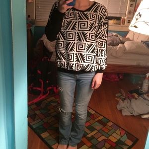 Black and white bull over sweater